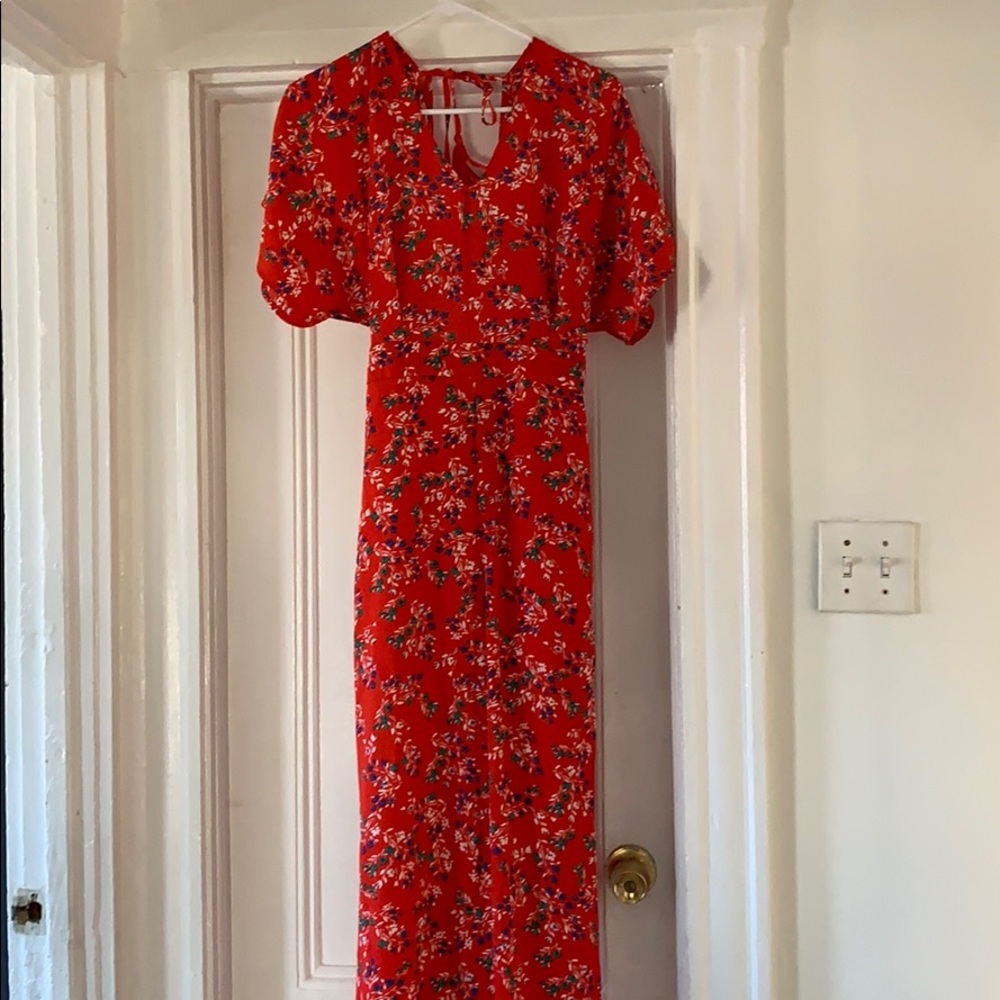Francescas red floral open back jumpsuit